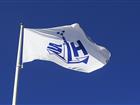 Stockholms Hamnars flagga vajar i vinden